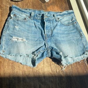 Levi’s 501 mid rise light wash distressed jean shorts size 26